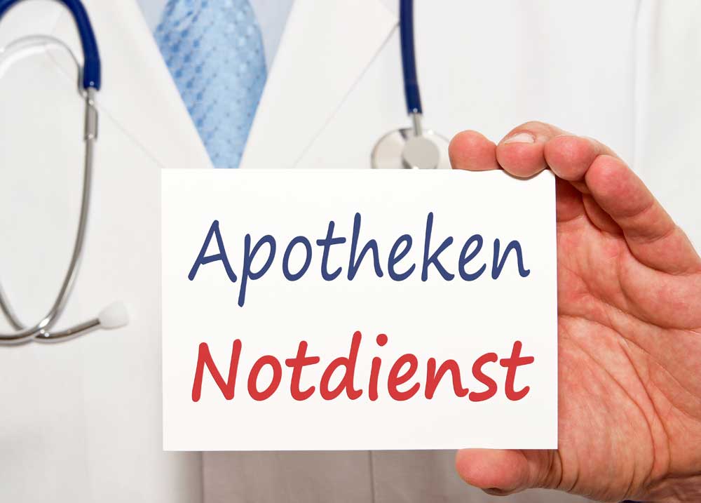 APOTHEKEN NOTDIENST KOLBERMOOR - Arzt hält Apotheken Notdienst Schild